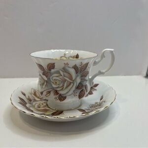 ROYAL ALBERT Floral footed tea cup and saucer bone china England